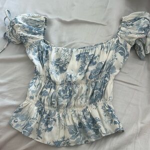 Reformation smocked blue and white top